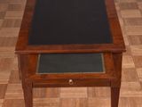 an image of a small table with a black top