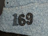 a close up of a hat with a number on it