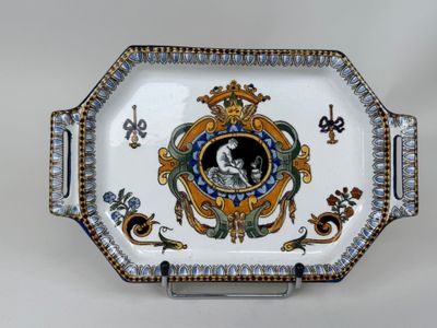 a decorative tray with a picture of a woman on it