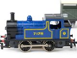 a toy train that is sitting next to a toy train