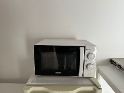 a microwave that is sitting on top of a table