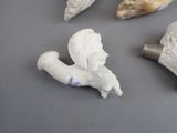 four different types of figurines on a table