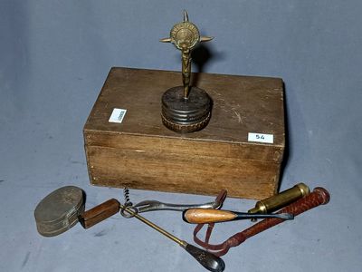a small wooden box with a statue on top of it