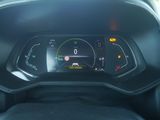 a dashboard of a car with a digital display
