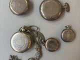 a lot of silver items that are on the table