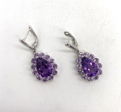 paire de boucles d'oreilles en améthorate et topaze blanche