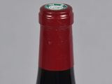 a bottle of wine that is sitting on a table