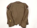 an image of a jacket with three patches on the sleeves