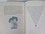 an open book with a picture of a girl and a tree