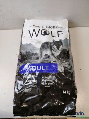 a bag of the hunger wolf adult dry dog food sitting on a counter