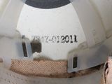 a close up of a helmet with a hole in it