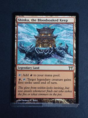a close up of a card with a picture of a boat in the water