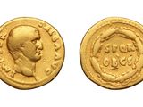 a gold coin with an image of a man on it
