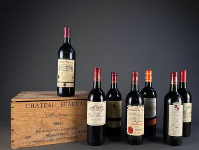 six bottles of wine are lined up in front of a wooden box