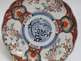 a plate with a design on it on a white surface