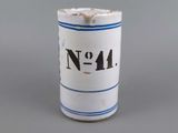 a close up of a small cup with a number on it