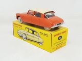a toy car that is sitting on top of a box