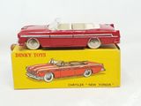 toy car in a box on a white surface with a yellow box