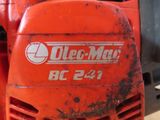 a close up of a red gas powered engine