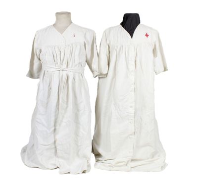 pair of white medical gowns on mannequins on a white background