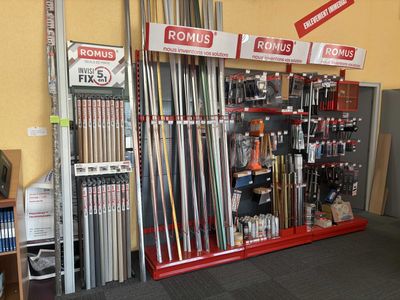 a picture of a store with a rack of golf clubs