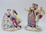 pair of porcelain figurines of a man and a woman
