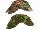 two hats with camouflage print on them sitting next to each other