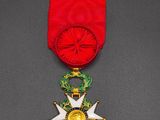 a close up of a medal with a star on it