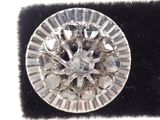 a picture of a diamond ring on a black velvet surface