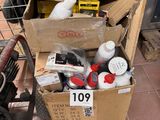 a box full of assorted items sitting on the floor
