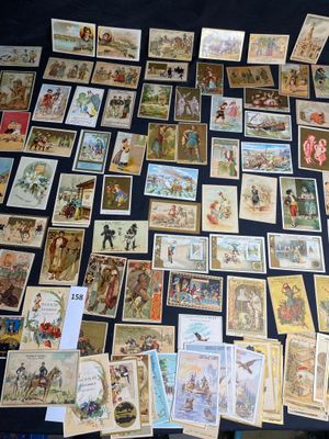 a lot of old postcards on the table