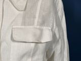 a close up of a white shirt on a mannequin mannequin