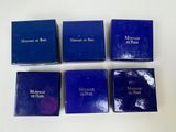 four boxes of blue boxes with the names of four different brands