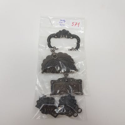 a close up of a bag of metal items on a table