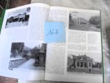 un livre ouvert sur lequel figure l'image d'un train