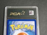 the game is in a plastic case on a black surface