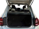 the back of a silver car with its trunk open and seats down