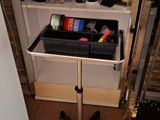 a small table with a lot of items in it