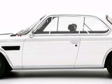 a white car that is sitting on a white surface