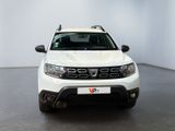 the front view of a white dacia parked in a white room