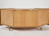 an image of a wooden coffee table with wheels