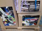 two boxes that have scissors and other items in them