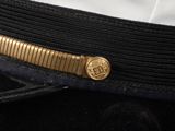 a close up of a hat on a man ' s lapel