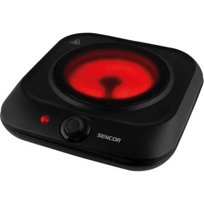 a close up of a black and red electric stove top