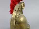 helmet of a roman soldier with a red plume on the top