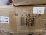 a box with a barcode on it sitting on the floor