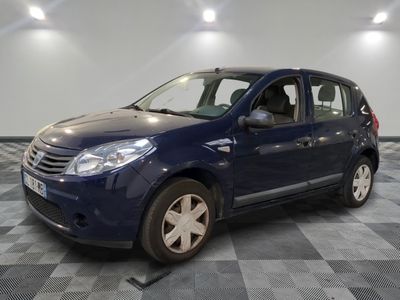 a picture of a blue car parked in a garage