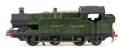 a green train on the tracks on a white background