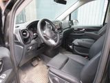 the interior of a car with a steering wheel and dashboard controls