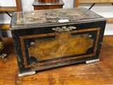 a wooden box sitting on top of a wooden table